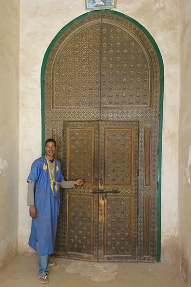 carved painted wooden door